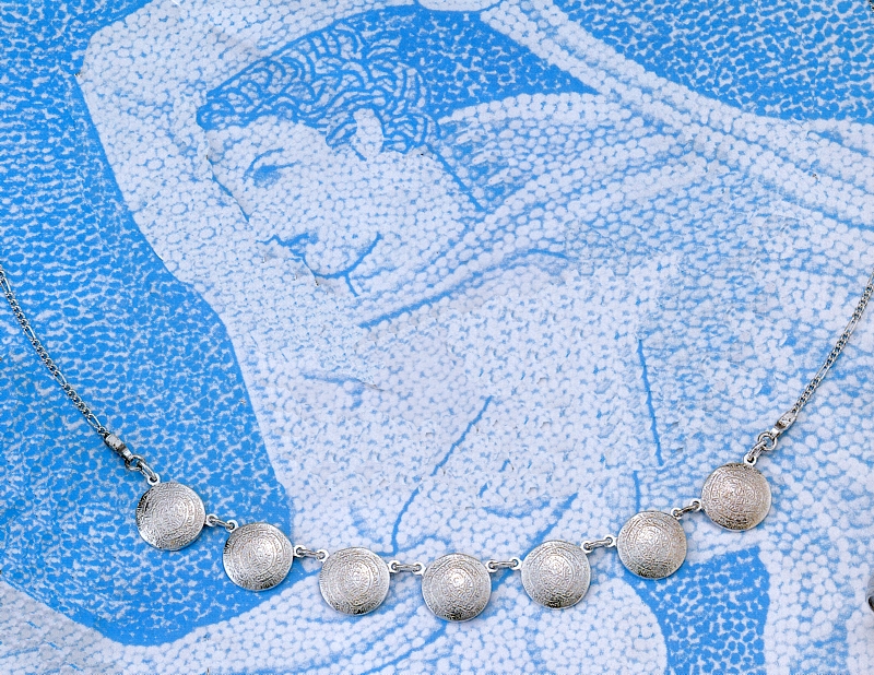 ak49.jpg Disk of Phaistos Necklace