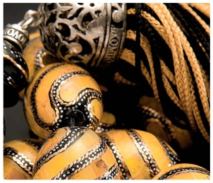 The  meanings of Komboloi